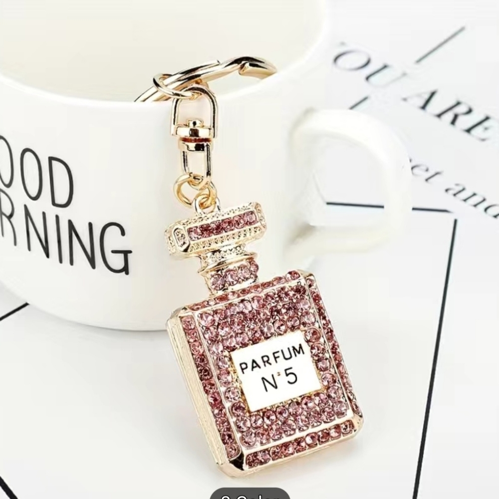 Nwtib. Classy Purfume bottle pink bling key ring